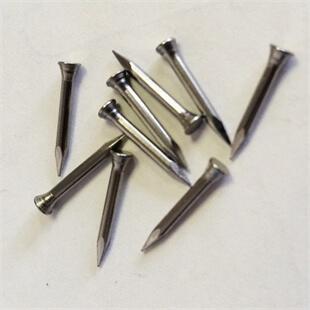 Image displaying a small pile of Small Cone Head Steel Rivets