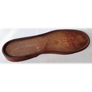Photo of a brown eva randed sole unit