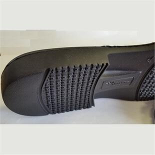 photo of a black shoe sole in rubber material
