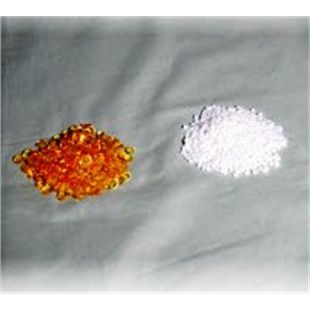 View of two piles of hot melt adhesive granules for shoe adhesive 